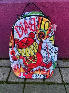 Sprayground Red, Yellow & Green Graffiti Backpack